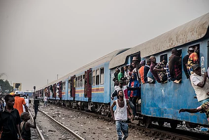 An image of people boarding a train in the DRC